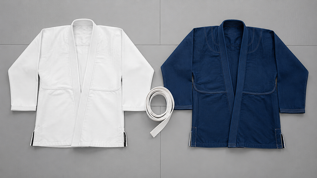 White and navy BJJ gi jackets laid side by side for comparison — best BJJ gi Australia